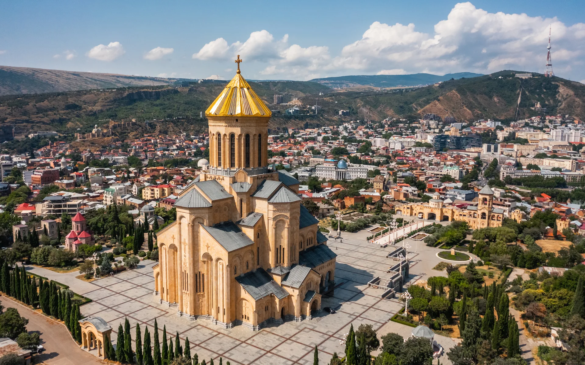 Aerial view of Holy Trinity Cathedral (Sameba) in Tbilisi with its golden dome