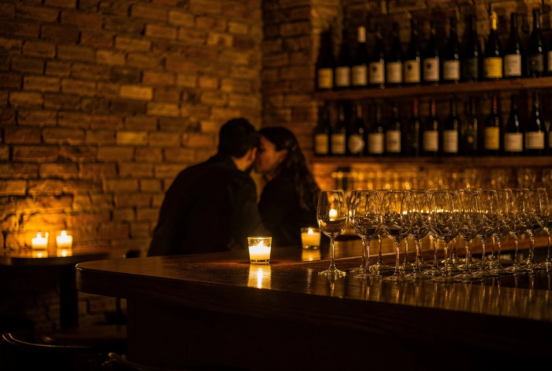Cozy natural wine bar interior in Tbilisi with candlelight and brick walls